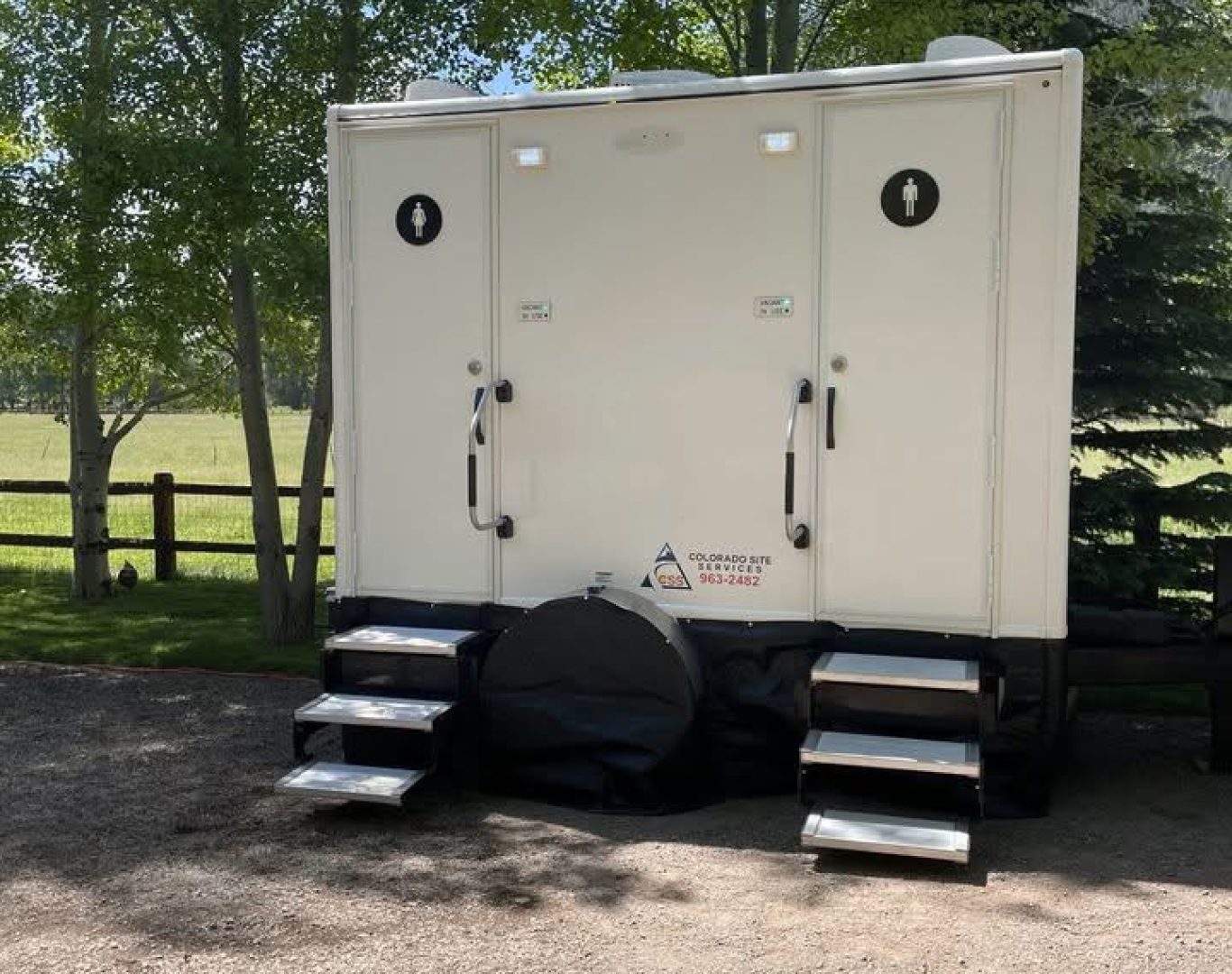 Kan Doo Portable Toilets providing RV and camper pumping service in Hudson Valley, NY., Event planner assessing portable restroom placement near busy outdoor venue entrance